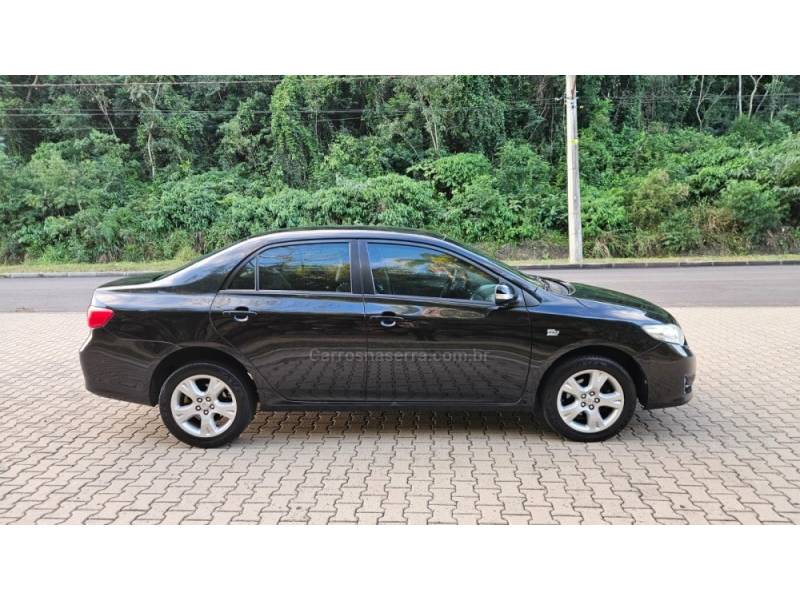 TOYOTA - COROLLA - 2010/2011 - Preta - R$ 50.000,00