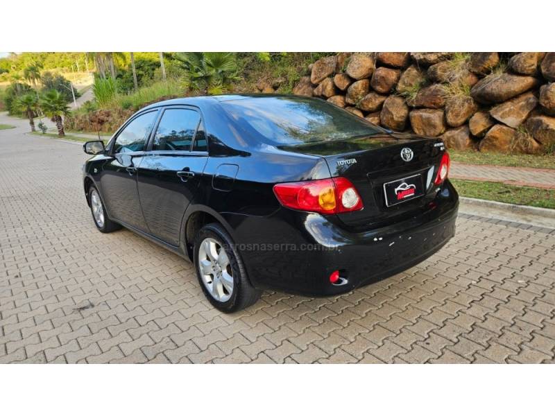 TOYOTA - COROLLA - 2010/2011 - Preta - R$ 50.000,00