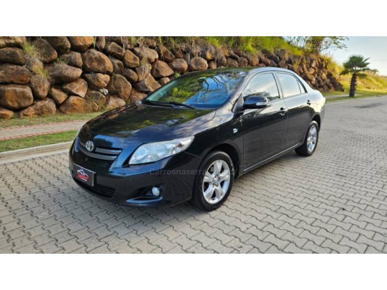 TOYOTA - COROLLA - 2010/2011 - Preta - R$ 50.000,00
