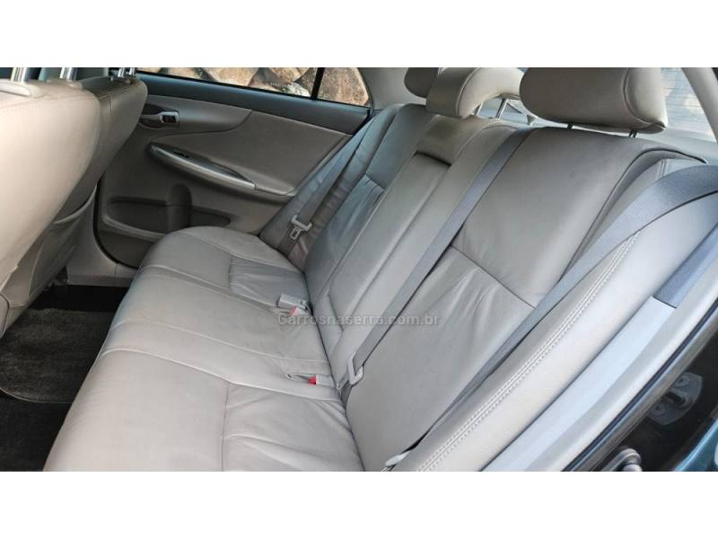 TOYOTA - COROLLA - 2010/2011 - Preta - R$ 50.000,00