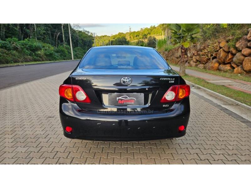 TOYOTA - COROLLA - 2010/2011 - Preta - R$ 50.000,00