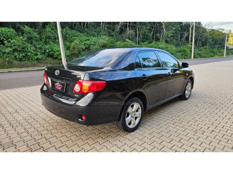 TOYOTA - COROLLA - 2010/2011 - Preta - R$ 50.000,00