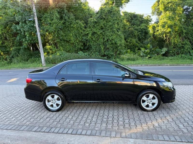 TOYOTA - COROLLA - 2010/2011 - Preta - R$ 50.900,00