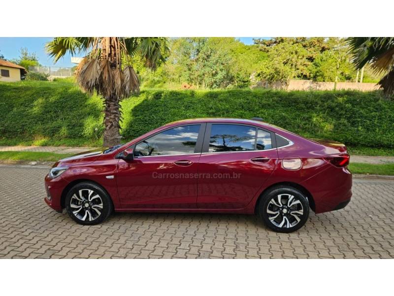 CHEVROLET - ONIX - 2022/2023 - Vermelha - R$ 90.900,00