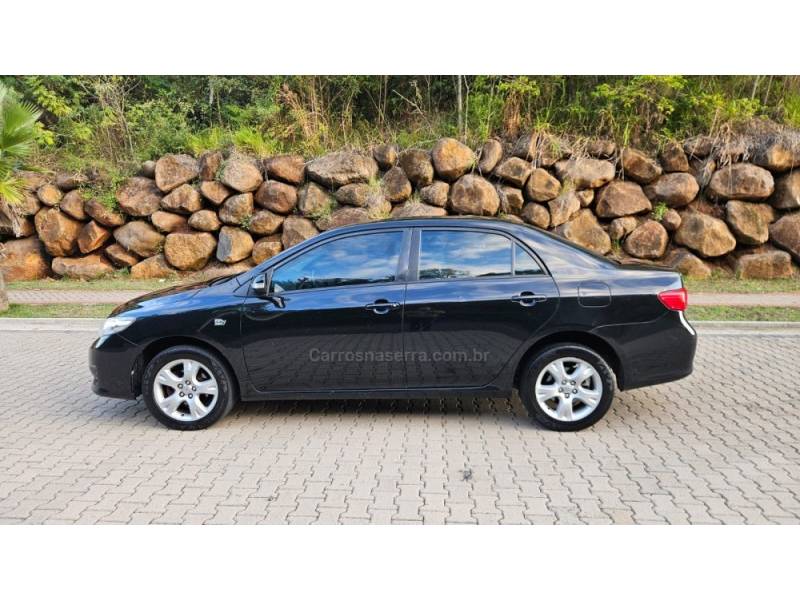 TOYOTA - COROLLA - 2010/2011 - Preta - R$ 50.000,00